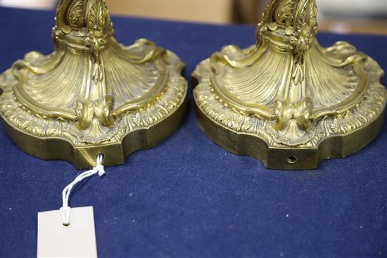 A pair Louis XVI ormolu candlesticks, height 12in.